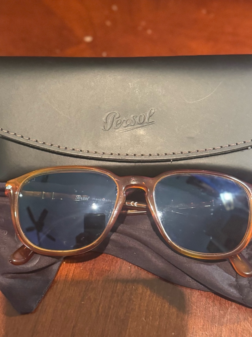 Persol Tortoiseshell Frame Sunglasses with Dark Blue Lenses